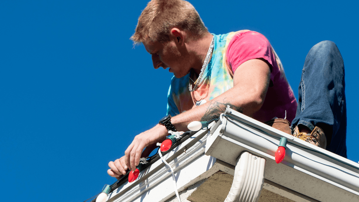 service person installing roof lights